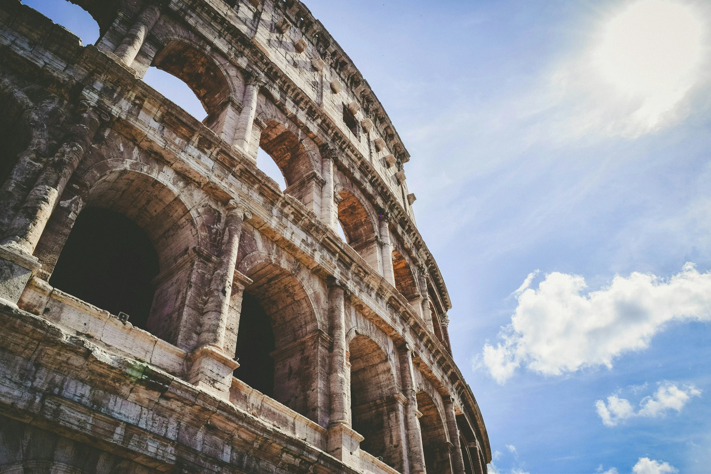 The sweeping ancient arches of the Colosseum in Rome